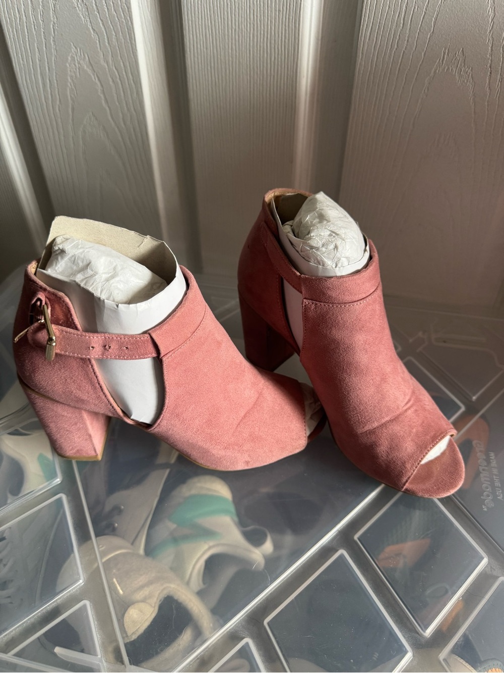 Pink wedged booties